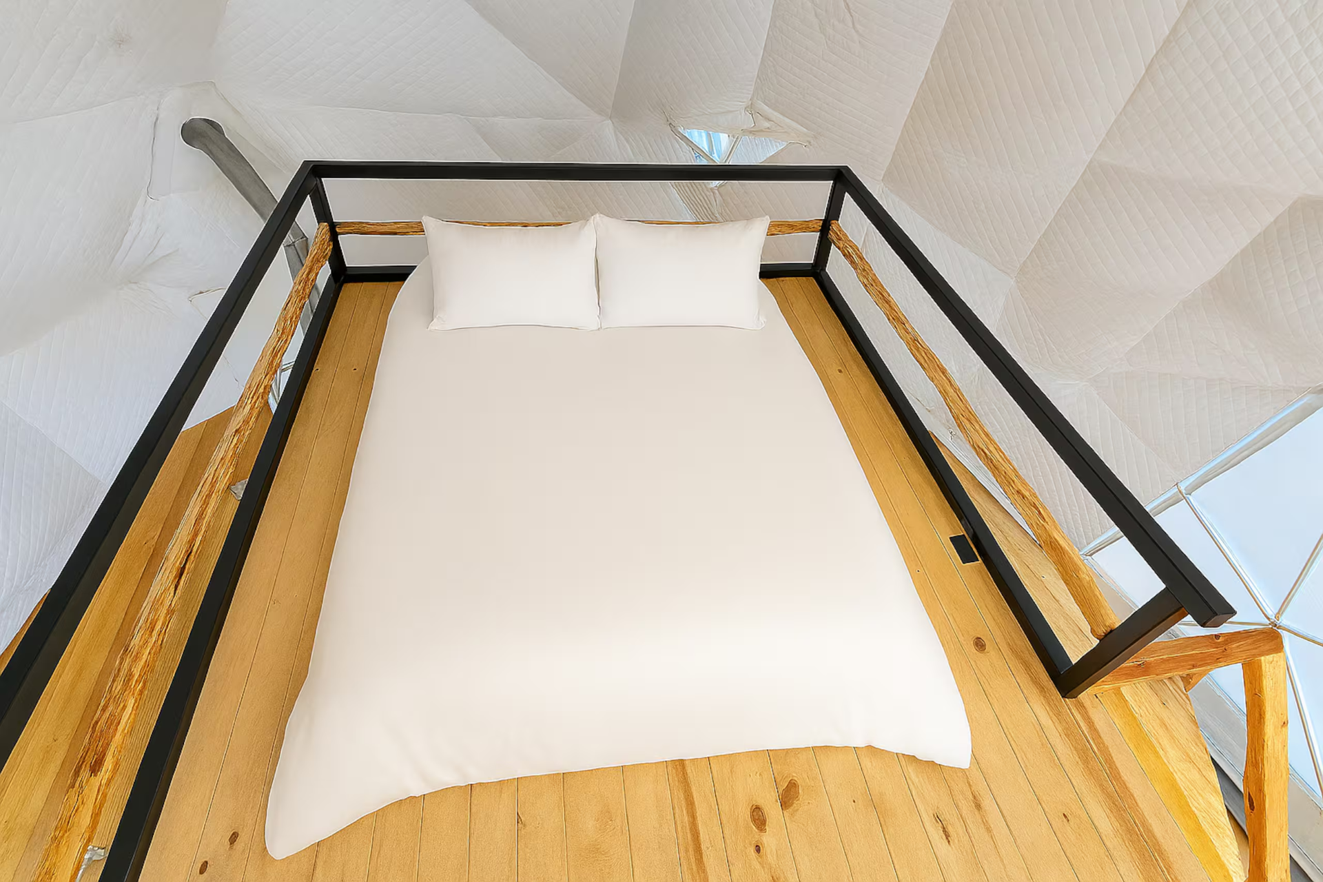 Cama matrimonial del loft superior